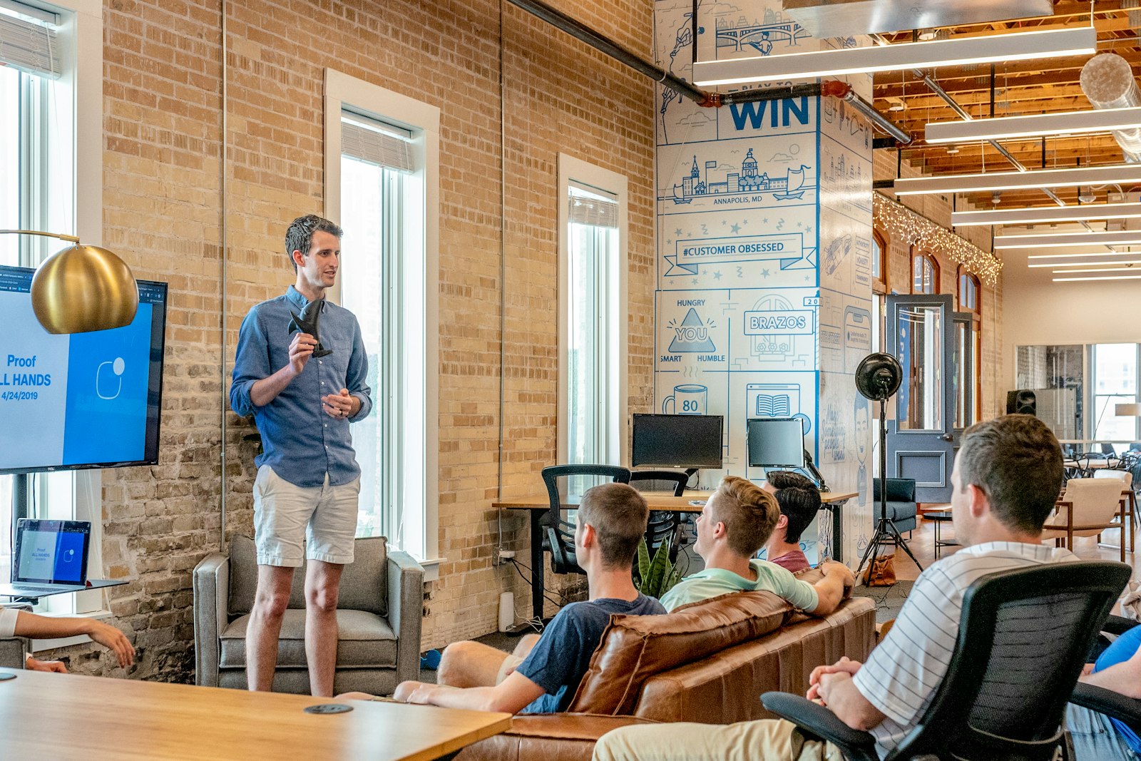 Team presentation in a bright loft office